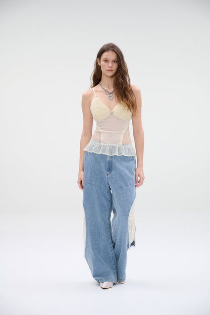 Wide-leg denim jeans with lace panel cutouts